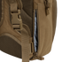 Close-up of the Condor Fuel Hydration Backpack 18L in brown, featuring a side zipper pocket for gear, mesh padding, and an adjustable strap with plastic buckle for comfort.