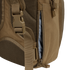 Close-up of the Condor Fuel Hydration Backpack 18L in brown, featuring a side zipper pocket for gear, mesh padding, and an adjustable strap with plastic buckle for comfort.