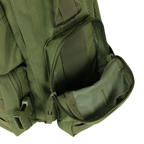 A close-up view of an open zippered pocket on the Condor Convoy Backpack 22L in Scorpion OCP, highlighting the fabric texture and stitching details.
