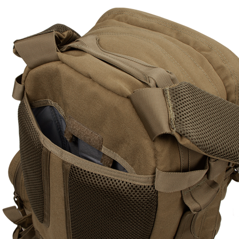 A close-up of the Condor Convoy Backpack 22L in brown, designed for EDC, featuring an open front pocket with mesh details and padded shoulder straps.