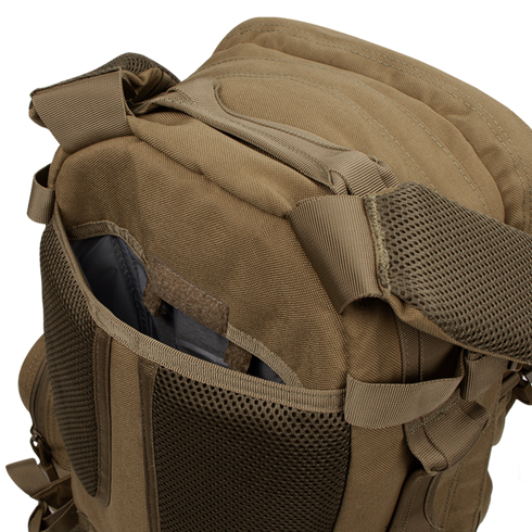 A close-up of the Condor Convoy Backpack 22L in brown, designed for EDC, featuring an open front pocket with mesh details and padded shoulder straps.