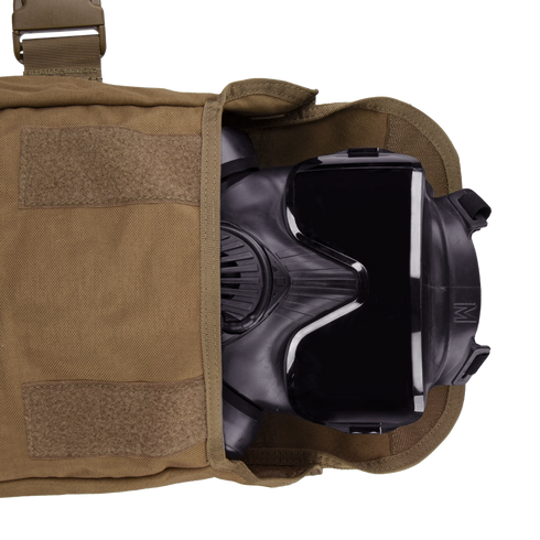 The Condor Gas Mask Leg Rig, in black, is partially tucked inside a tan bag with a Velcro flap—perfect gear for first responders or law enforcement.