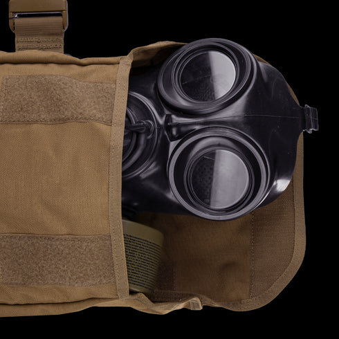 A Condor Gas Mask Leg Rig, partially visible inside an open brown canvas pouch, is commonly used by military or law enforcement personnel.