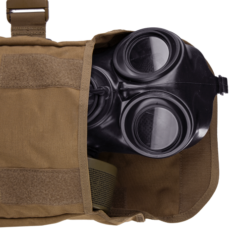 A Condor Gas Mask Leg Rig, partially visible inside an open brown canvas pouch, is commonly used by military or law enforcement personnel.