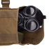 A Condor Gas Mask Leg Rig, partially visible inside an open brown canvas pouch, is commonly used by military or law enforcement personnel.