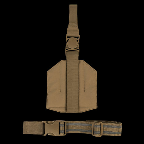 The Condor LCS Drop Leg Panel is a tan nylon rig with adjustable straps, a large side buckle, and central loop—designed for carrying gear or accessories.