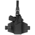 The Condor LCS RDS Leg Holster, shown in black with a secured handgun, features adjustable straps and a quick-release buckle, displayed against a plain white background.