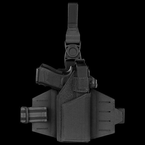 The Condor LCS RDS Leg Holster is a black tactical thigh holster with adjustable straps and a retention buckle, designed to securely hold your handgunāperfect for military or law enforcement professionals.