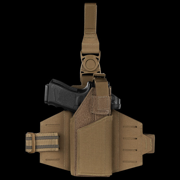 The Condor LCS RDS Leg Holster, shown in tan with a black handgun, is designed for military or first responder use and displayed against a white background.
