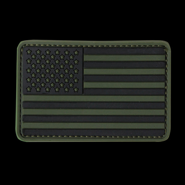 The Condor US Flag PVC Patch features a subdued black and olive green American flag design, ideal for military, law enforcement, or tactical gear.