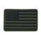 The Condor US Flag PVC Patch features a subdued black and olive green American flag design, ideal for military, law enforcement, or tactical gear.