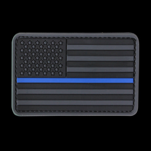 The Condor US Flag PVC Patch features a black and gray American flag with a single blue stripe, representing support for law enforcement.