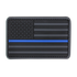 The Condor US Flag PVC Patch features a black and gray American flag with a single blue stripe, representing support for law enforcement.