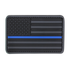 The Condor US Flag PVC Patch features a black and gray American flag with a single blue stripe, representing support for law enforcement.