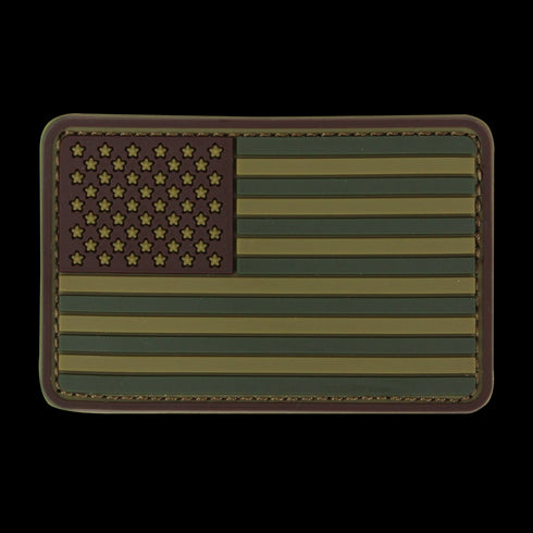 The Condor US Flag PVC Patch features a subdued green and brown stars-and-stripes design, outlined with stitching—perfect for law enforcement uniforms or bushcraft gear.