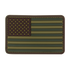 The Condor US Flag PVC Patch features a subdued green and brown stars-and-stripes design, outlined with stitching—perfect for law enforcement uniforms or bushcraft gear.