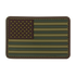The Condor US Flag PVC Patch features a subdued green and brown stars-and-stripes design, outlined with stitching—perfect for law enforcement uniforms or bushcraft gear.