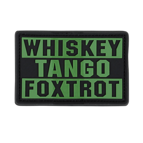 The Condor Whiskey Tango Foxtrot PVC Patch features bold olive drab letters on a black background, ideal for military personnel or collectors.
