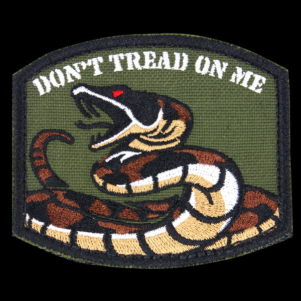 The Condor Dont Tread On Me Patch features a coiled rattlesnake and bold text on an olive green background—ideal for bushcraft gear or the shooting range.