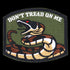 The Condor Dont Tread On Me Patch features a coiled rattlesnake and bold text on an olive green background—ideal for bushcraft gear or the shooting range.