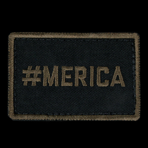 The Condor MERICA PATCH is a rectangular black fabric patch with #MERICA embroidered in olive green—ideal for military uniforms or shooting range gear.