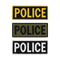 The Condor Police Patch set includes three rectangular patches—yellow on black, black on green, and white on black—all with bold POLICE text, arranged vertically. Perfect for everyday carry or shooting range use.