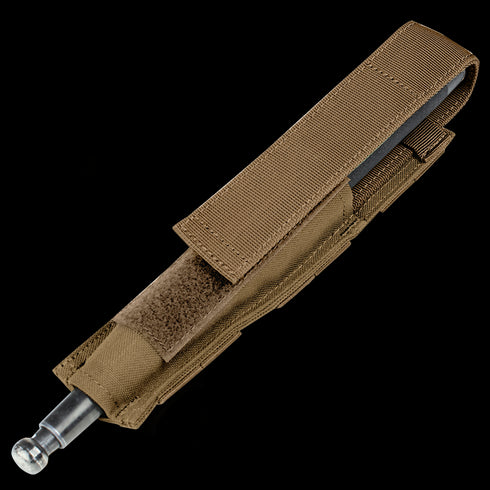 The Condor Baton Pouch in Coyote Brown features a fabric sheath with flap cover, MOLLE compatibility for versatile law enforcement carry, and is designed to hold an expandable baton.