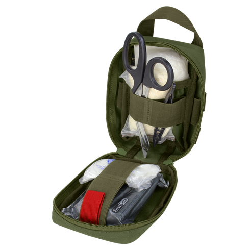 The Condor EMT Leg Rig is open, revealing medical scissors, gauze, bandages, and other emergency supplies neatly organized inside.