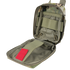 The Condor Rip-Away EMT Pouch Lite in MultiCam is an open, empty pouch featuring internal elastic straps, a red left-side pull tab, and MOLLE compatibility for secure attachment.