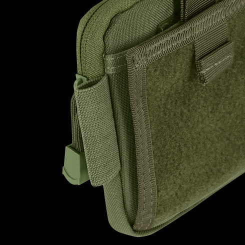 Close-up of the Condor Annex Admin Pouch, a green fabric pouch featuring a zipper, Velcro flap, and reinforced edge stitching.