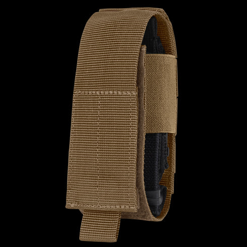 The Condor Universal TQ Pouch in Coyote Brown features hook and loop closure, is MOLLE compatible for easy attachment, and securely holds a tourniquet or similar medical devices for quick access.
