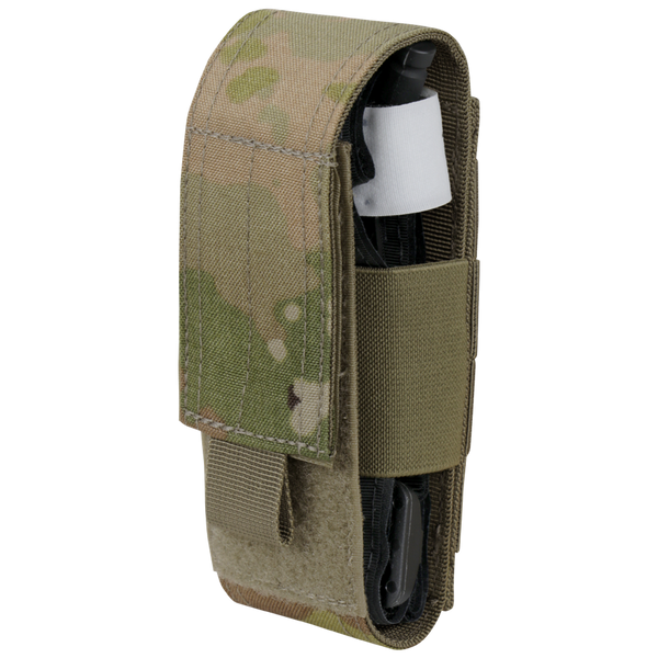 The Condor Universal TQ Pouch - Scorpion OCP features a camouflage design and hook-and-loop flap, with a black tourniquet partially visible at the top.