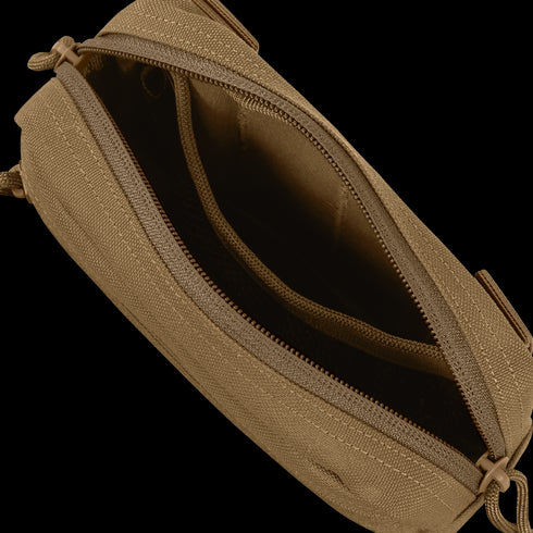 The Condor Compact Utility Pouch in tan fabric is shown from above with the zipper open, displaying an empty main compartment and inner pocket—perfect for bushcraft essentials or law enforcement gear.