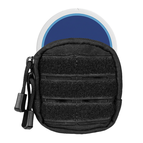 The Condor Dip Pouch, a small black zippered case with horizontal straps, is displayed with a round blue and white item partially visible behind it.