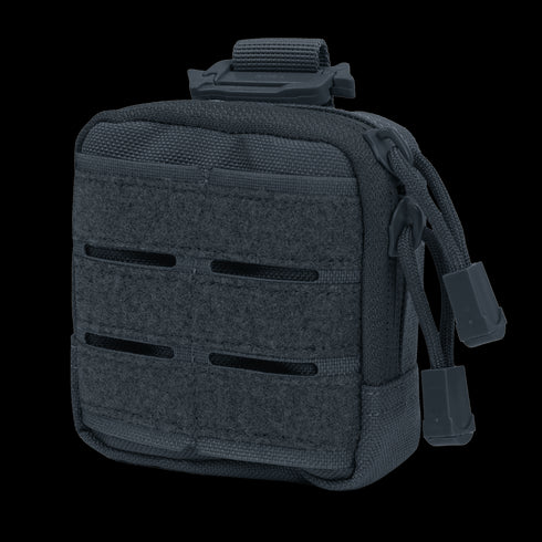 The Condor Dip Pouch is a compact black tactical pouch with a zipper closure, webbing loops, and hook-and-loop panels on the front—perfect for organizing and carrying small gear for military or law enforcement use.