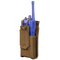 The Condor Patrol Radio Pouch Gen II in brown fabric with a flap cover holds a blue handheld radio, ideal for bushcraft or EDC, shown against a white background.