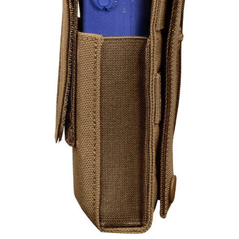 A close-up side view of the Condor Patrol Radio Pouch Gen II in tan fabric, featuring a flap with snap button securing a blue plastic object—perfect for bushcraft or shooting range use.