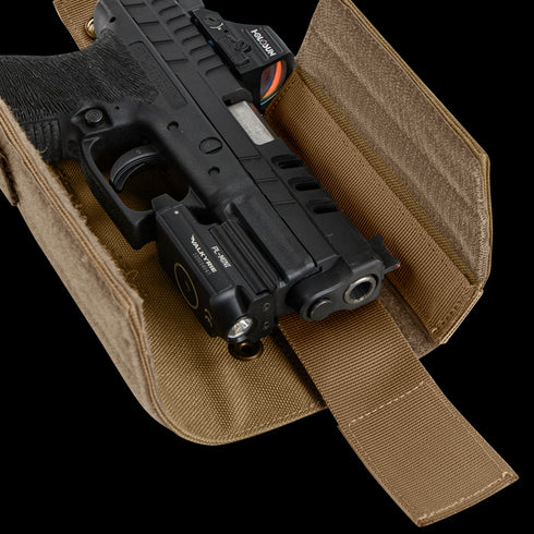 The Condor RDS Holster is a tan fabric holster with Velcro strap, designed to securely hold a black handgun with tactical light—ideal for military or first responders.