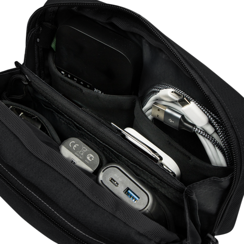 The Condor Tech Pouch - MultiCam Black is a versatile organizer for EDC, ideal for carrying power banks, charging cables, adapters, and a portable hard drive.