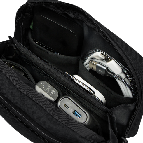 The Condor Tech Pouch - MultiCam Black is a versatile organizer for EDC, ideal for carrying power banks, charging cables, adapters, and a portable hard drive.