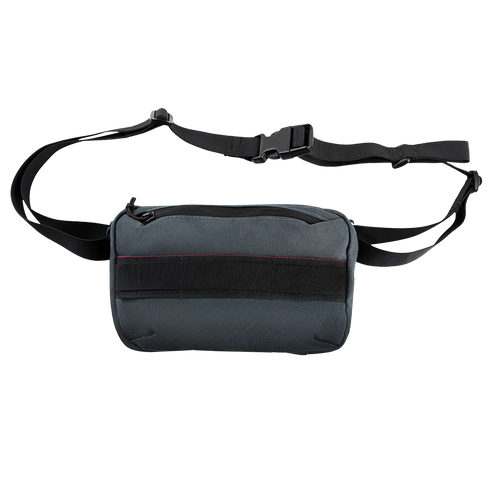 The Condor Tech Pouch is a small, rectangular, dark gray sling bag with a black adjustable shoulder strap and zippered main compartment—ideal for carrying your EDC or bushcraft essentials.