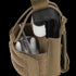 The Condor Narcan Pouch in tan holds a tourniquet, medical shears, and other instruments, with Velcro and strap closures—ideal for military, EDC, or bushcraft use.
