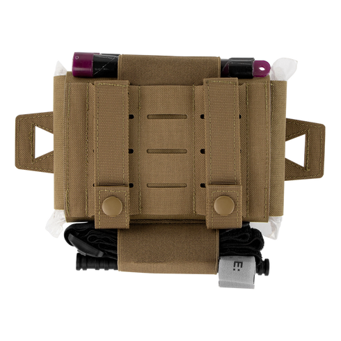 The Condor Micro TK Pouch Gen II is a tan tactical pouch with straps, side loops, medical supplies partially visible at the top, and a black tourniquet secured at the bottom.