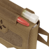 A close-up of the Condor Micro TK Pouch Gen II in tan, showing a red pen and white-capped tube inside, plus hook-and-loop patch and strap—perfect for organizing first responder essentials.