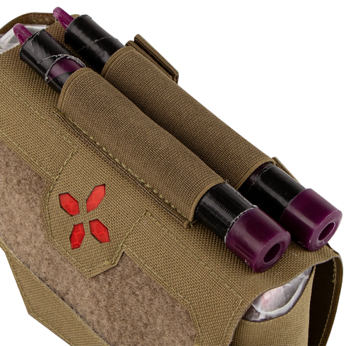 The Condor Micro TK Pouch Gen II is a tan tactical pouch featuring a red medical cross on the front flap and two purple-capped tourniquets secured in external straps.