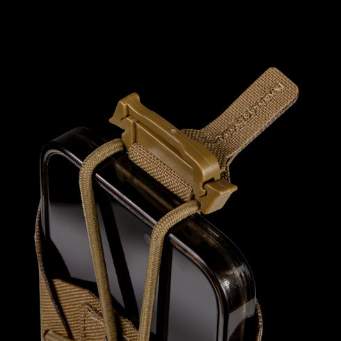 A close-up of the Condor LACE Phone Pouch—a brown tactical pouch featuring a tan buckle strap and elastic cords, holding a smartphone against a plain white background.