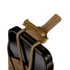 A close-up of the Condor LACE Phone Pouch—a brown tactical pouch featuring a tan buckle strap and elastic cords, holding a smartphone against a plain white background.