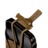 A close-up of the Condor LACE Phone Pouch—a brown tactical pouch featuring a tan buckle strap and elastic cords, holding a smartphone against a plain white background.