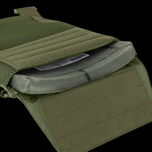 Close-up of the Condor Sentry Plate Carrier in olive green, showing an armor plate partially inserted into its Velcro-secured compartment.