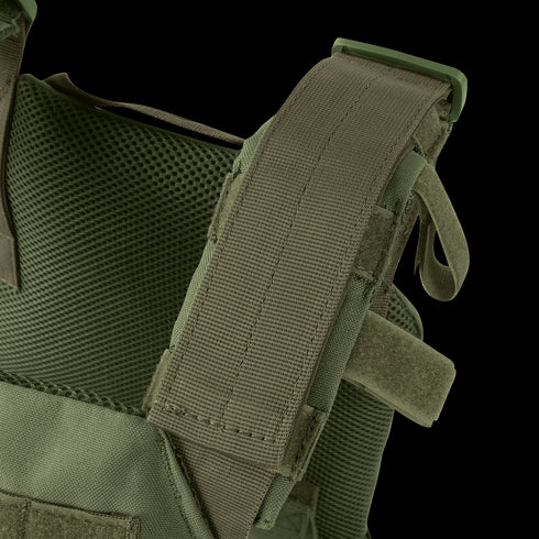 Close-up of the Condor Sentry Plate Carriers olive green shoulder strap, featuring reinforced stitching, mesh lining, and adjustable Velcro fasteners.